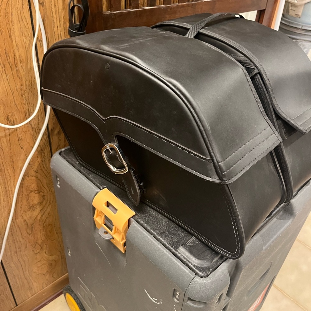 Motorcycle leather bags. Basically new, never used them and not getting one!